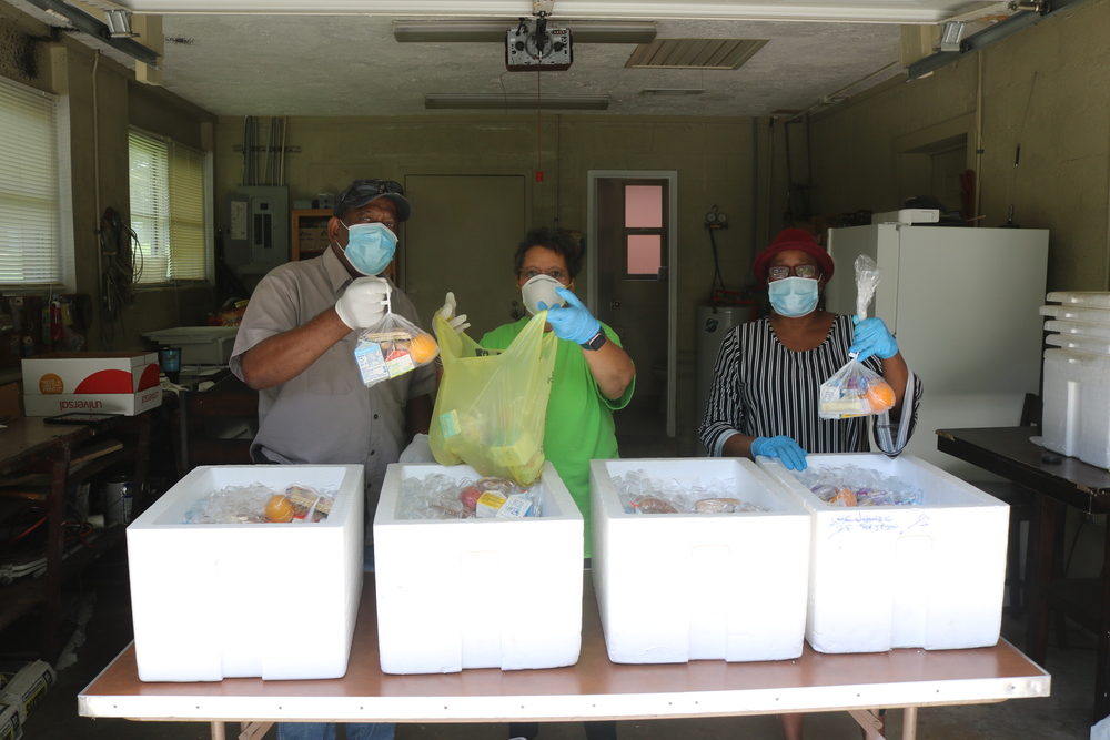 RHA Staff packaging Grab and Go meals