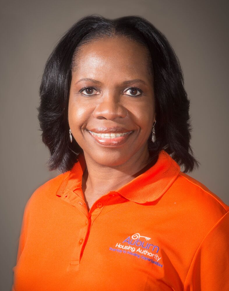 CEO Sharon N. Tolbert with orange shirt