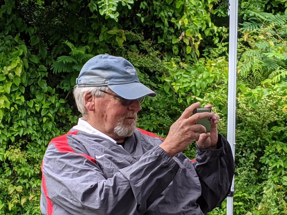 wonderful wednesday participant holding a camera