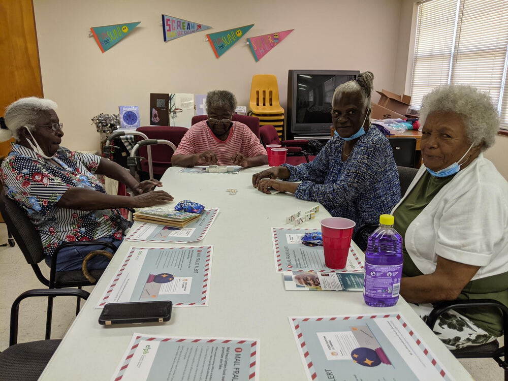 wonderful wednesday senior ladies gathered around table