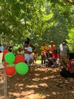 Juneteenth 2022 attendees standing around outside 