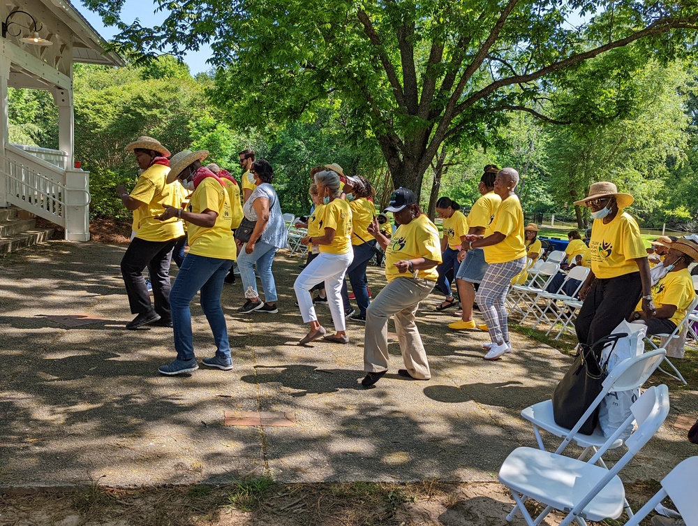 Older American's event attendees line dancing