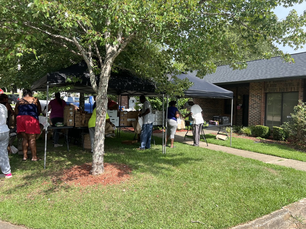 LHA Farmers Market line of attendees outside