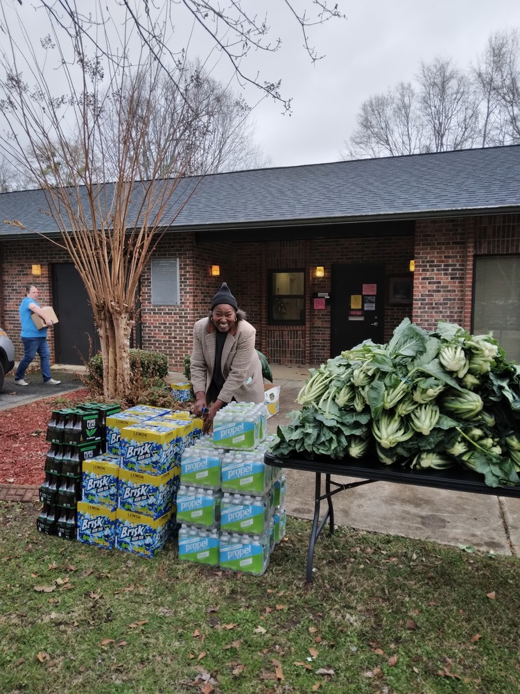 Commissioner Leverett at the LaFayette Farmers Market volunteering