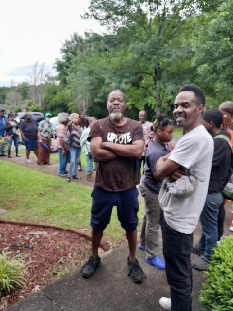 LHA farmers market participants standing outside