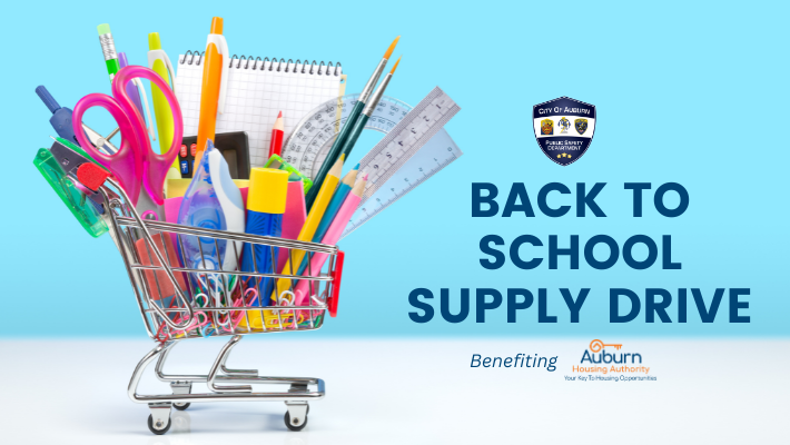 Back School Drive Public Safety with shopping cart full of school supplies