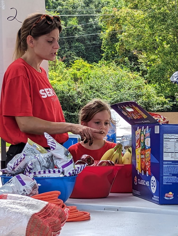 AHA Resident Service Serve girls with snacks