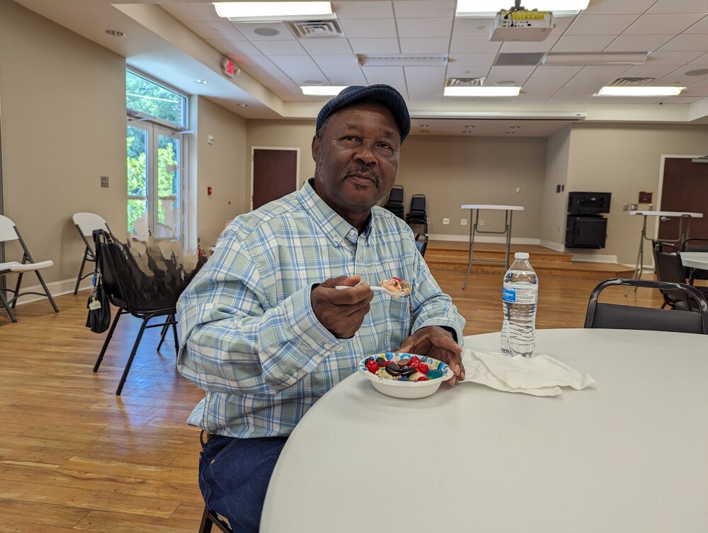 AHA Resident Service -Sr. Ice cream social older man eating sundae