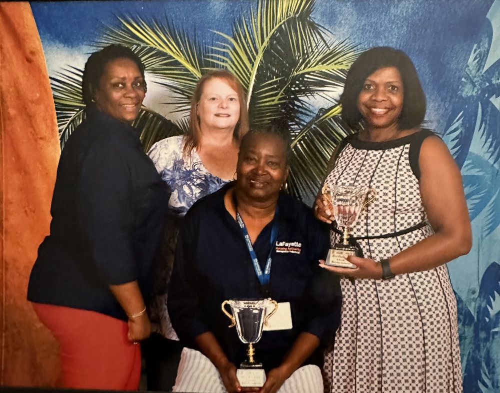 AAHRA Convention staff holding award