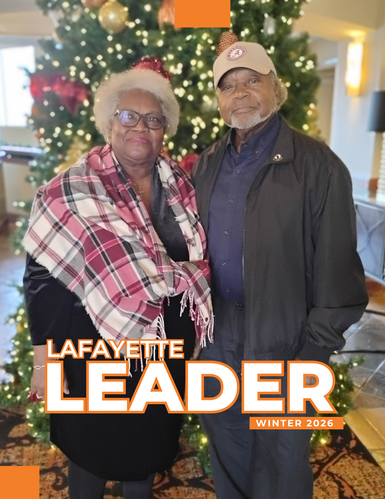 LaFayette Leader Winter 2026 with Commissioners in front of Christmas tree at Christmas party