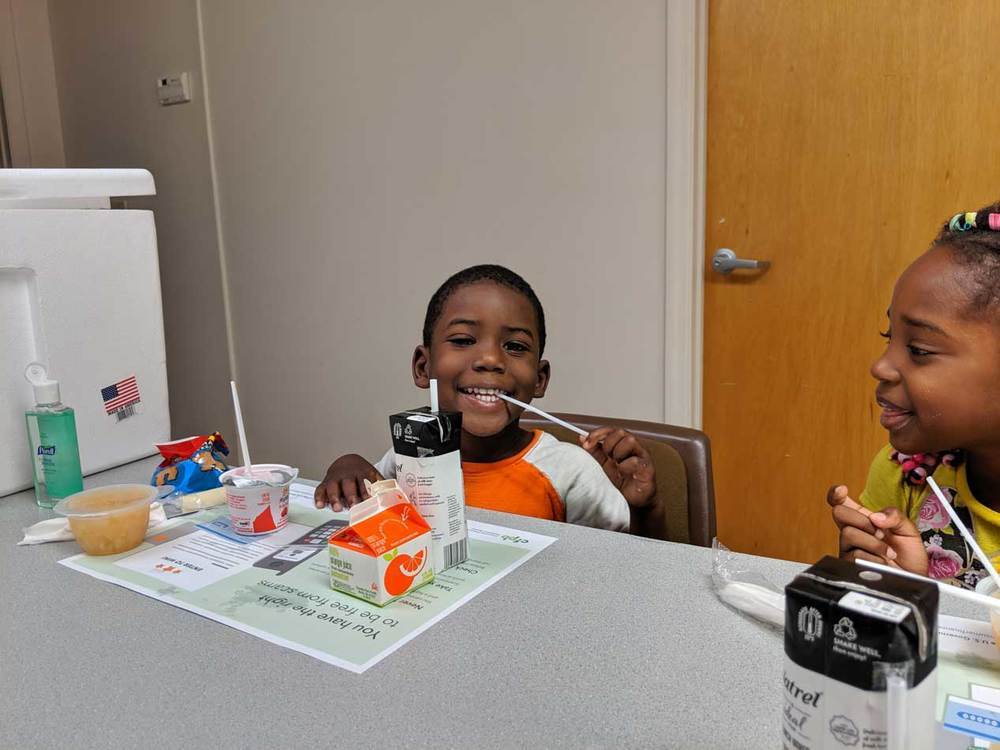 Kid at Summer Feeding 