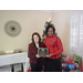 Bonnie Morgan holding her 15 year employee anniversary plaque with CEO Sharon Tolbert 