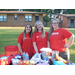 Church of Highlands Serve Team posing at National Night Out vendor table