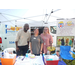 A family resource center staff posing at their National Night Out tent