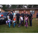 Auburn Police Department with bike giveaway recipients 