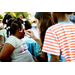 Young girl getting her face painted at National Night Out