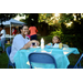 Mother and child sitting at table eating snacks