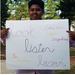 Chauncey Gauntt holding her poster for Fire Prevention Week Poster Contest 