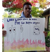 Jarmari Barron holding her poster for Fire Prevention Week Poster Contest 