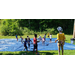 kids playing in sprinkler on lawn