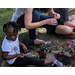 little girl painting flower pot