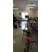 young girl pushing in her folding chair