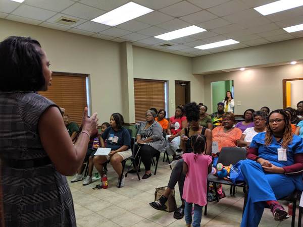 CEO Sharon Tolbert speaking to a group of residents at Homeownership Workshop