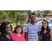 Resident Services Coordinator Charlotte Mattox posing with students outside Job Core building