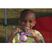 2019 NNO little boy smiling big and painting a pumpkin