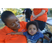 2019 NNO Employee Natasha Hall and holding baby boy
