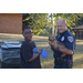 2019 NNO police Officer with youth resident and puppy