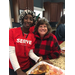 Charlotte Mattox and Auburn Serve member in front of food