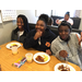 Youth residents enjoying breakfast food