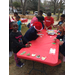 Christmas table with decorated cookies and crafts