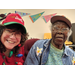 Charlotte Mattox and older resident smiling for camera