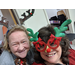 resident and staff at Christmas event wearing reindeer ears