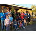 Sparkman youth residents outside office with decorated tree