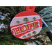 Christmas ornament with word hope on Christmas tree