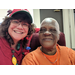 Charlotte Mattox and older female resident smiling for camera