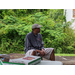 Male sitting outside enjoying Wonderful Wednesday event 