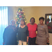 LHA Staff and Commissioner posing in front of Christmas tree with CEO Sharon Tolbert