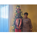 Sarah Nunn, Vice-Chairperson &amp; Resident Commissioner with CEO Sharon Tolbert in front of Christmas tree
