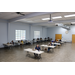 Aerial view of AHA Employee Meeting. Staff sitting behind desks in a spacious building.