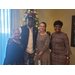 Commissioner White, Torbert and Waldrop posing in front of Christmas tree with CEO Tolbert
