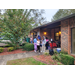 Community members outside building talking 