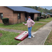 Young female playing corn hole