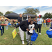 Female hugging young boy with excitement at National Night Out