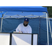 DJ under blue tent at National Night Out