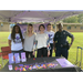Auburn Police officer and vendors posing together at National Night Out