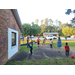 Youth playing outside with balls 